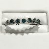 Blue Diamond 7-stone ring 14k wg
